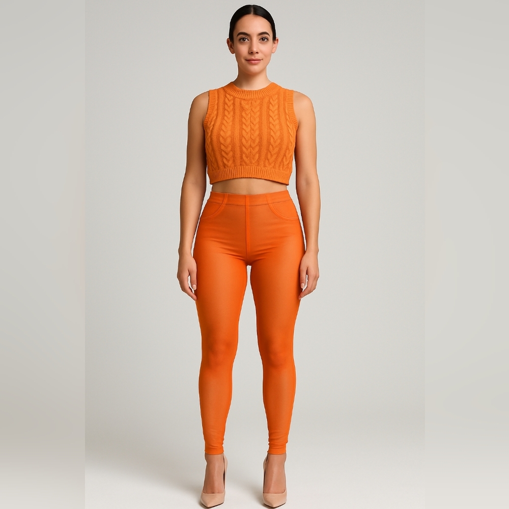 Women Shiny/ Glossy Leggings Body Shape Pants Orange With Stitched Design